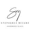 Logo for Stephanie McCune Handmade Glass with a stylized 'SM' design on a white background.